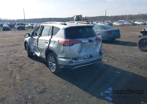 2016 Toyota Rav4 Hybrid Limited z USA, uszkodzony, nr VIN JTMDJREV4GD017099
